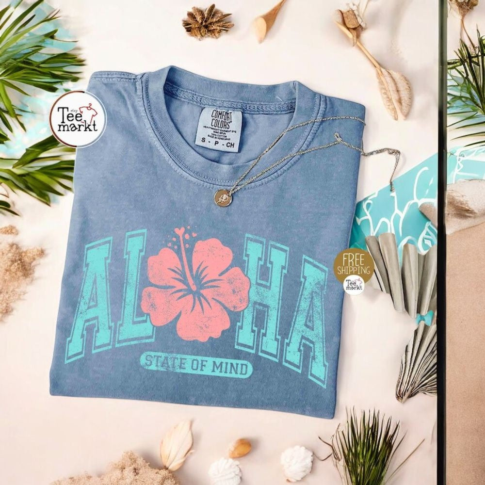 Vintage Aloha T-shirt, Summer Comfort Colors  
Varsity Hawaii Shirt, Hibiscus Flower Tee  
Aloha Vacation Apparel, State of Mind Shirt