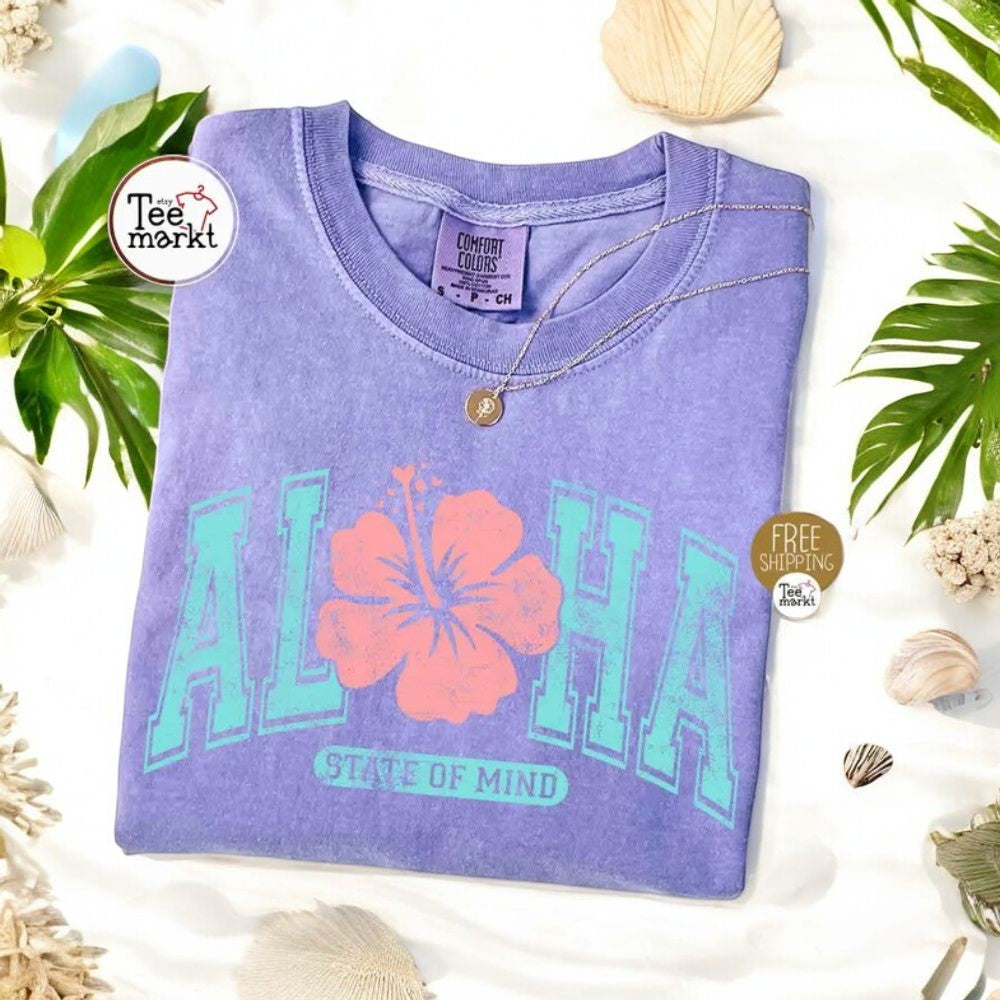 Vintage Aloha T-shirt, Summer Comfort Colors  
Varsity Hawaii Shirt, Hibiscus Flower Tee  
Aloha Vacation Apparel, State of Mind Shirt